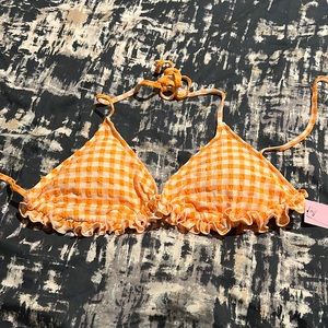 A orange and white bikini
